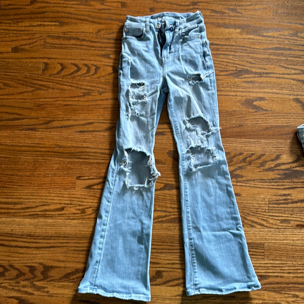 American Eagle stretch flare ripped jeans size 000, good used condition